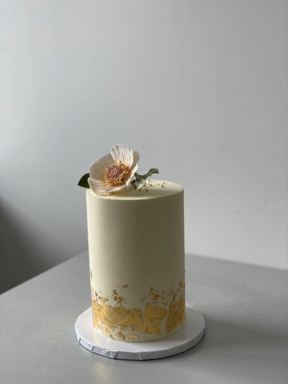 Sugar flower &amp; gold foil on buttercream - custom cake