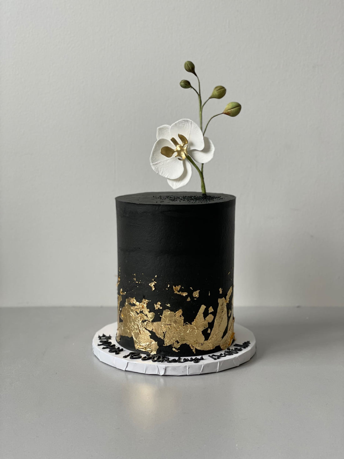 Sugar flower &amp; gold foil on buttercream - custom cake