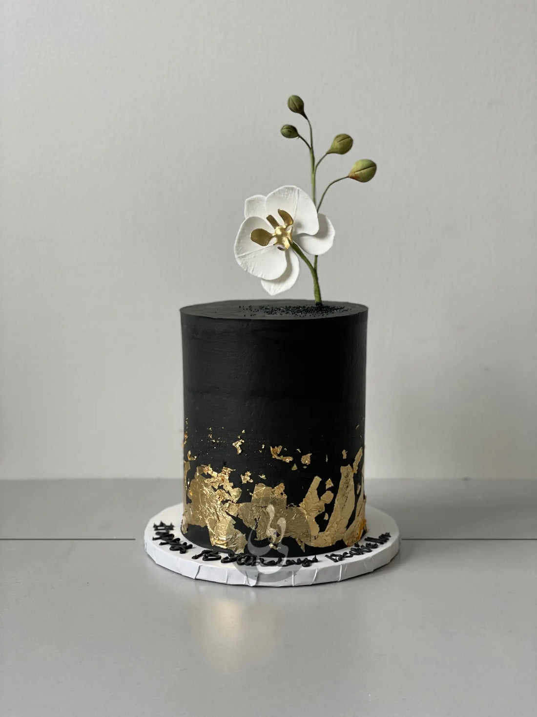 Sugar flower &amp; gold foil on buttercream - custom cake