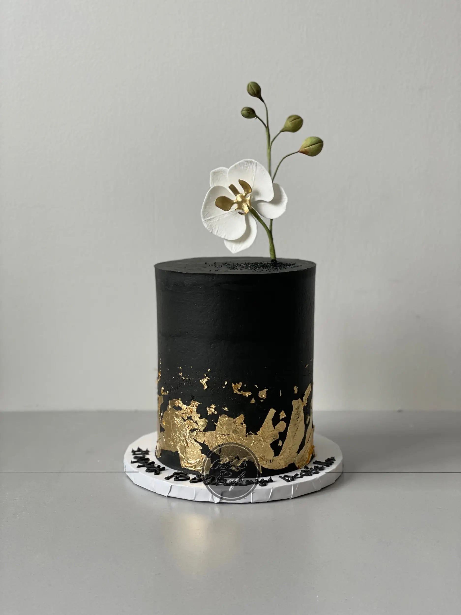 Sugar flower &amp; gold foil on buttercream - custom cake