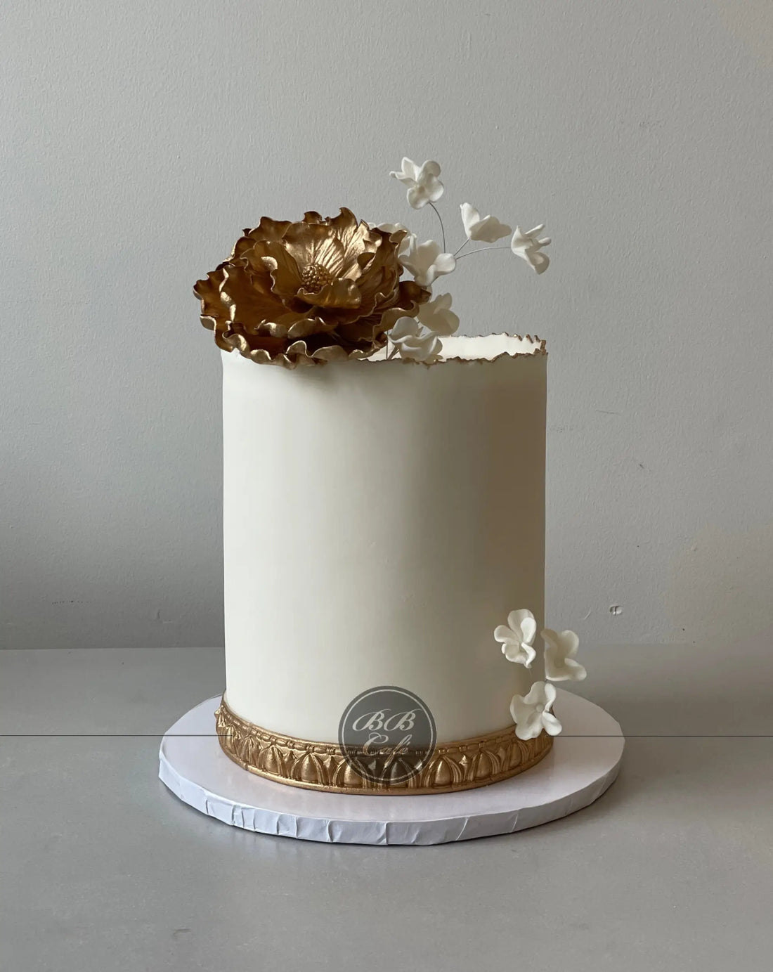 Sugar flower on deckled edge fondant - custom cake