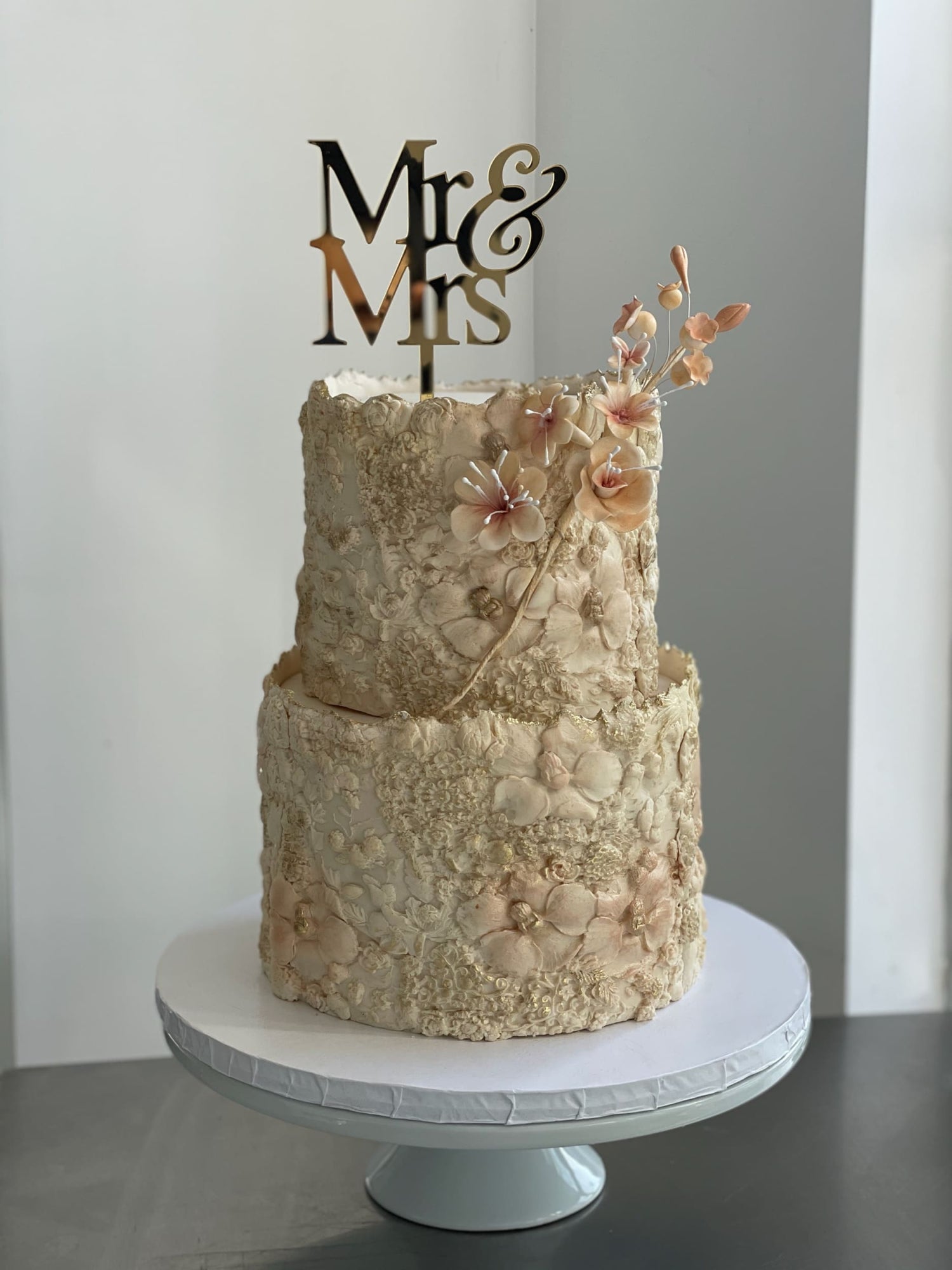 Sugar flower on floral imprinted fondant - custom cake