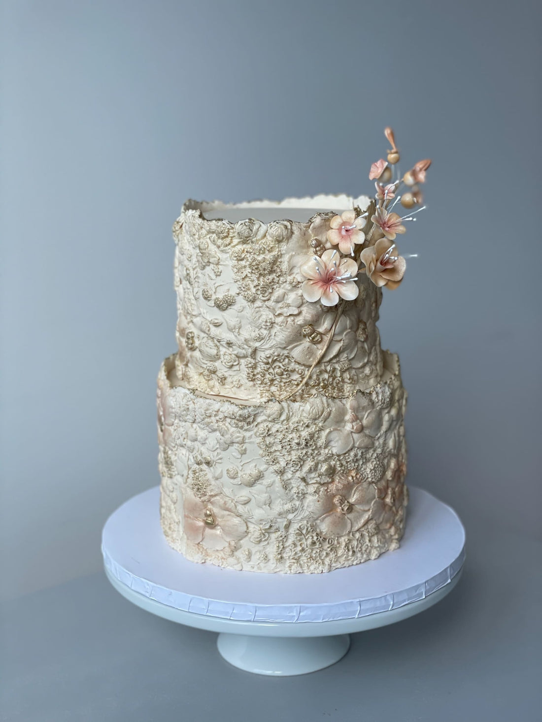 Sugar flower on floral imprinted fondant - custom cake