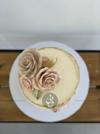 Sugar flowers on golden deckled edge buttercream - custom cake