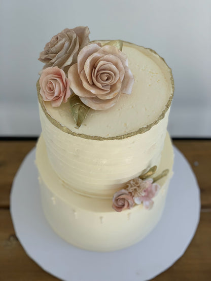 Sugar flowers on golden deckled edge buttercream - custom cake