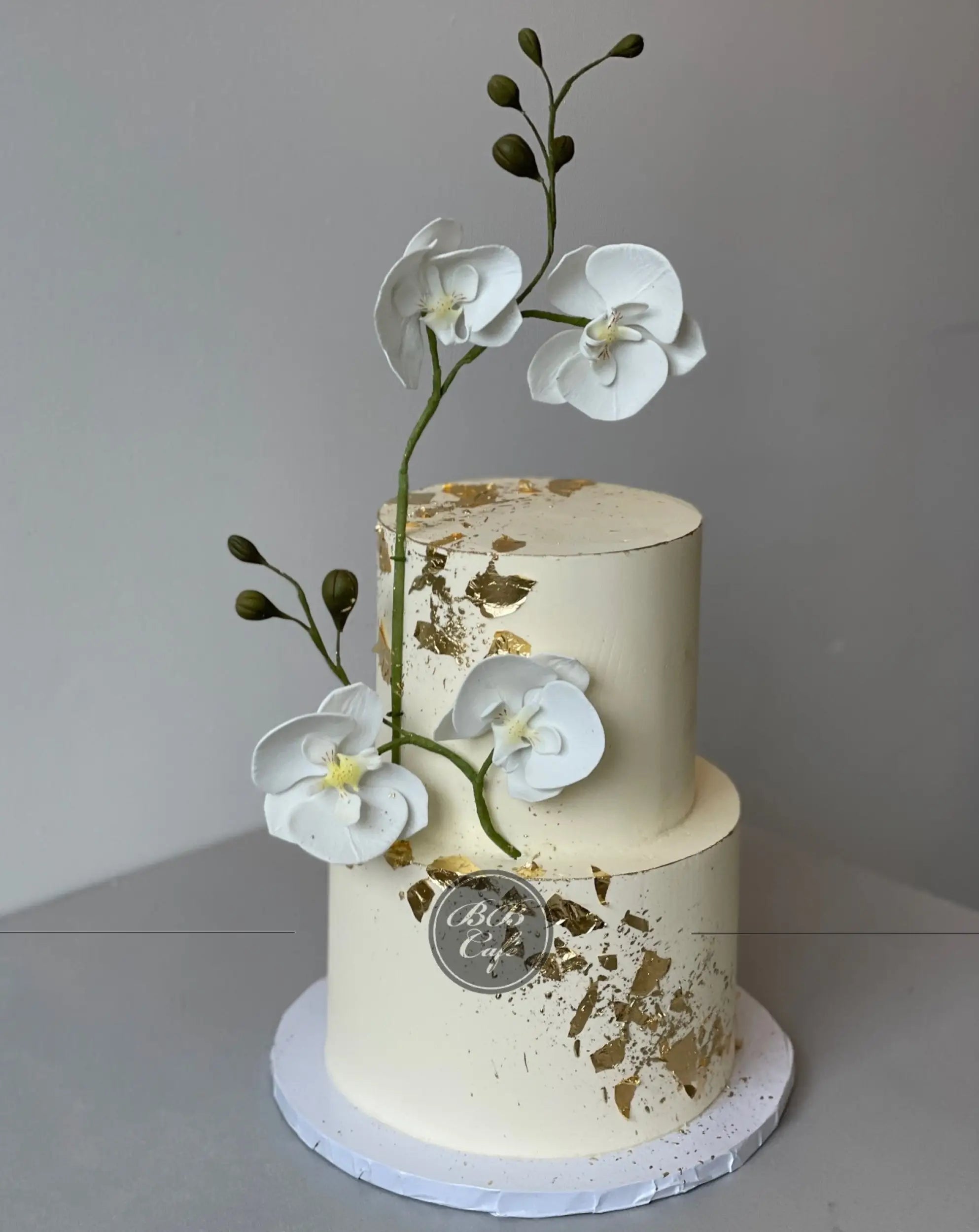 Sugar orchid stem on buttercream - custom cake