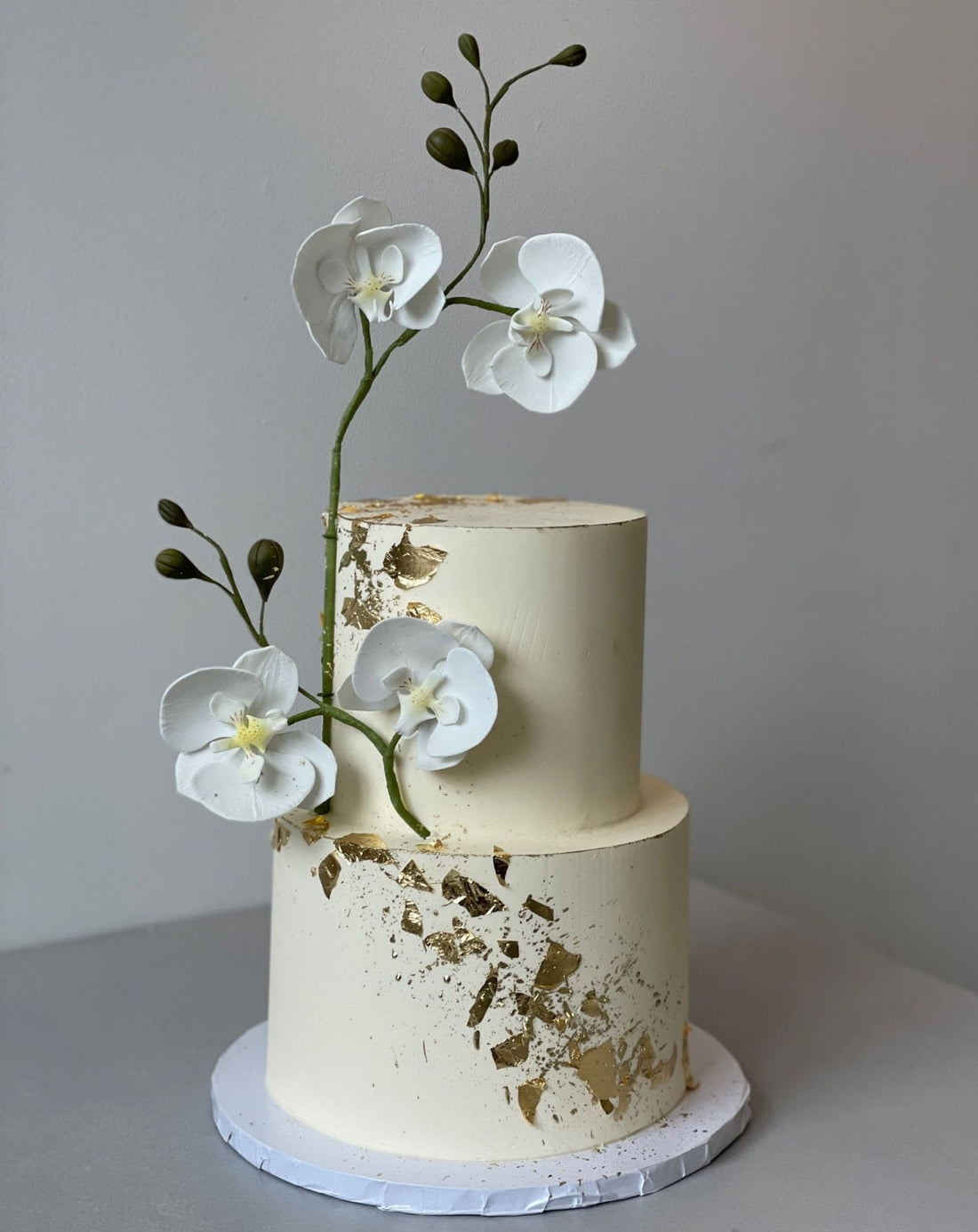 Sugar orchid stem on buttercream - custom cake