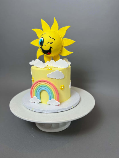 Sunshine &amp; rainbow on buttercream - custom cake