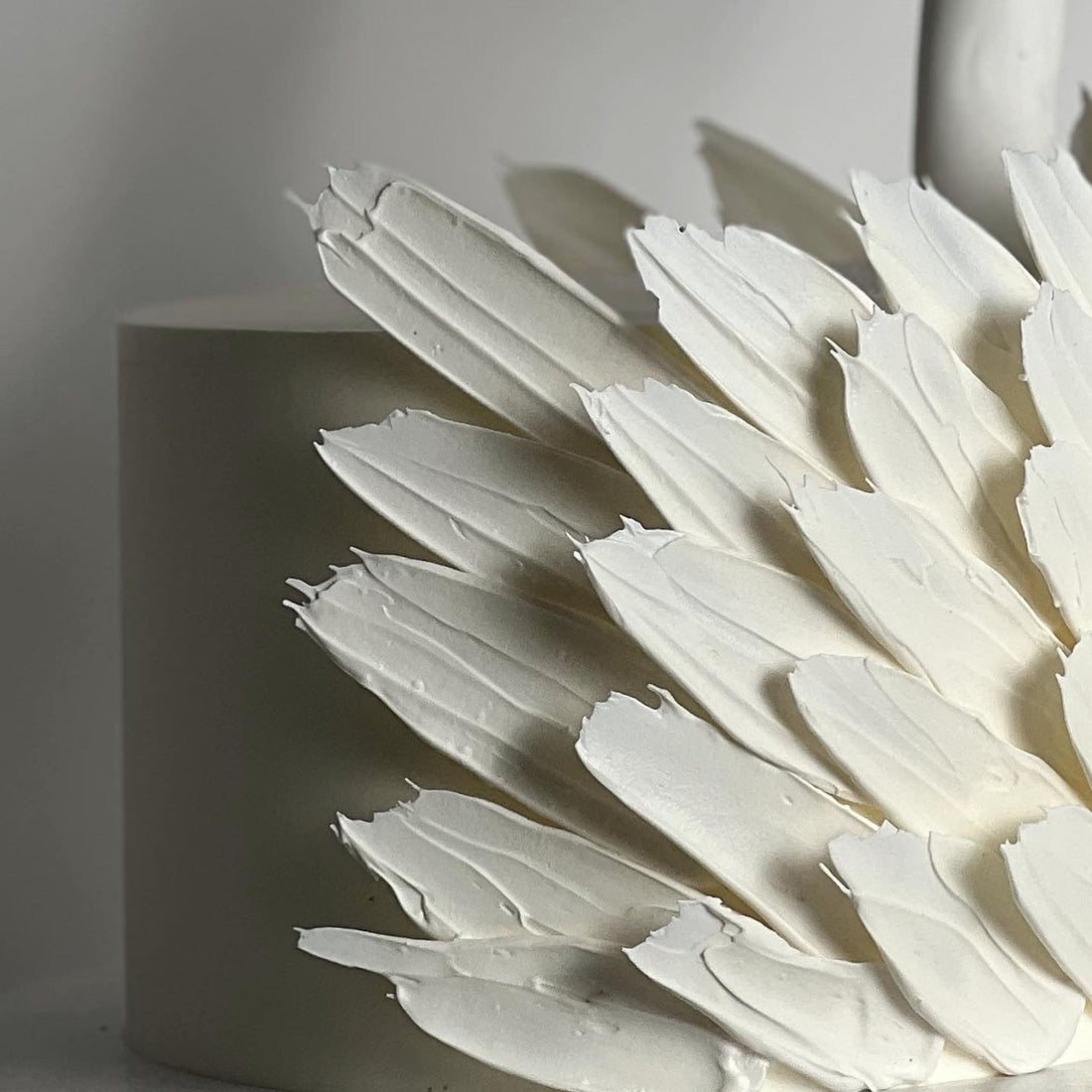 Swan &amp; chocolate feathers on buttercream - custom cake