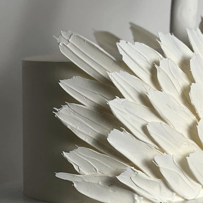 Swan &amp; chocolate feathers on buttercream - custom cake