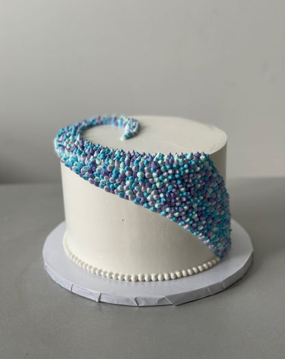 Swirl dots in whipped cream - custom cake