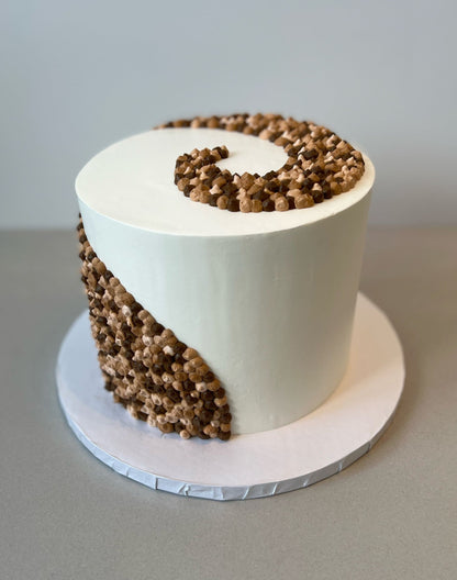 Swirl dots in whipped cream - custom cake
