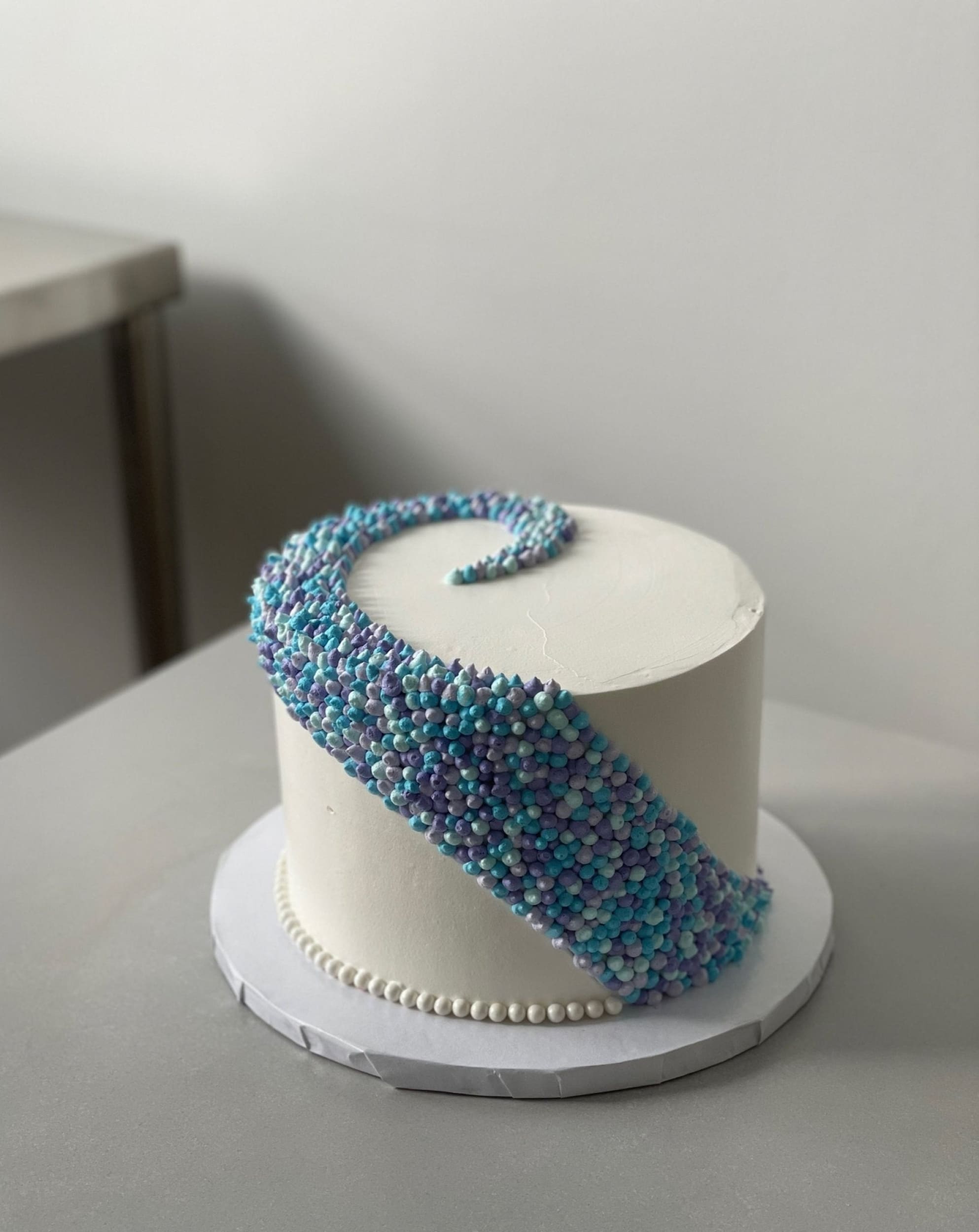 Swirl dots in whipped cream - custom cake