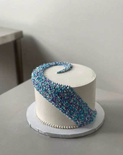 Swirl dots in whipped cream - custom cake