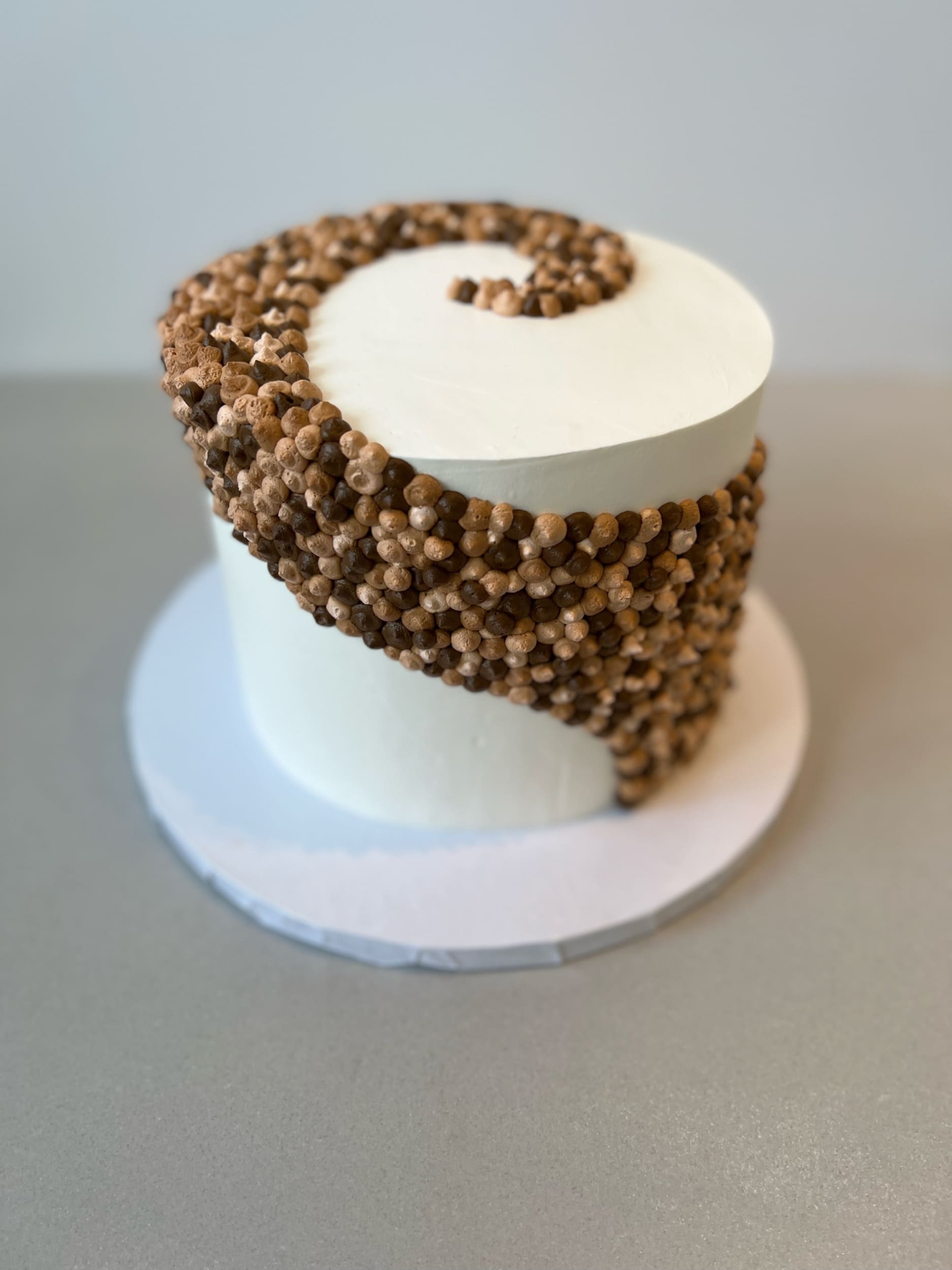 Swirl dots in whipped cream - custom cake
