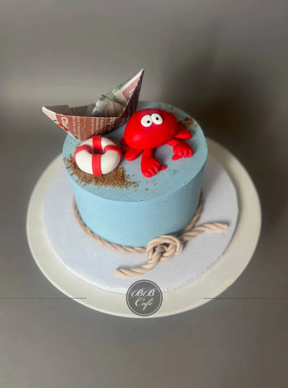 Nautical sea crab &amp; paper boat - custom cake