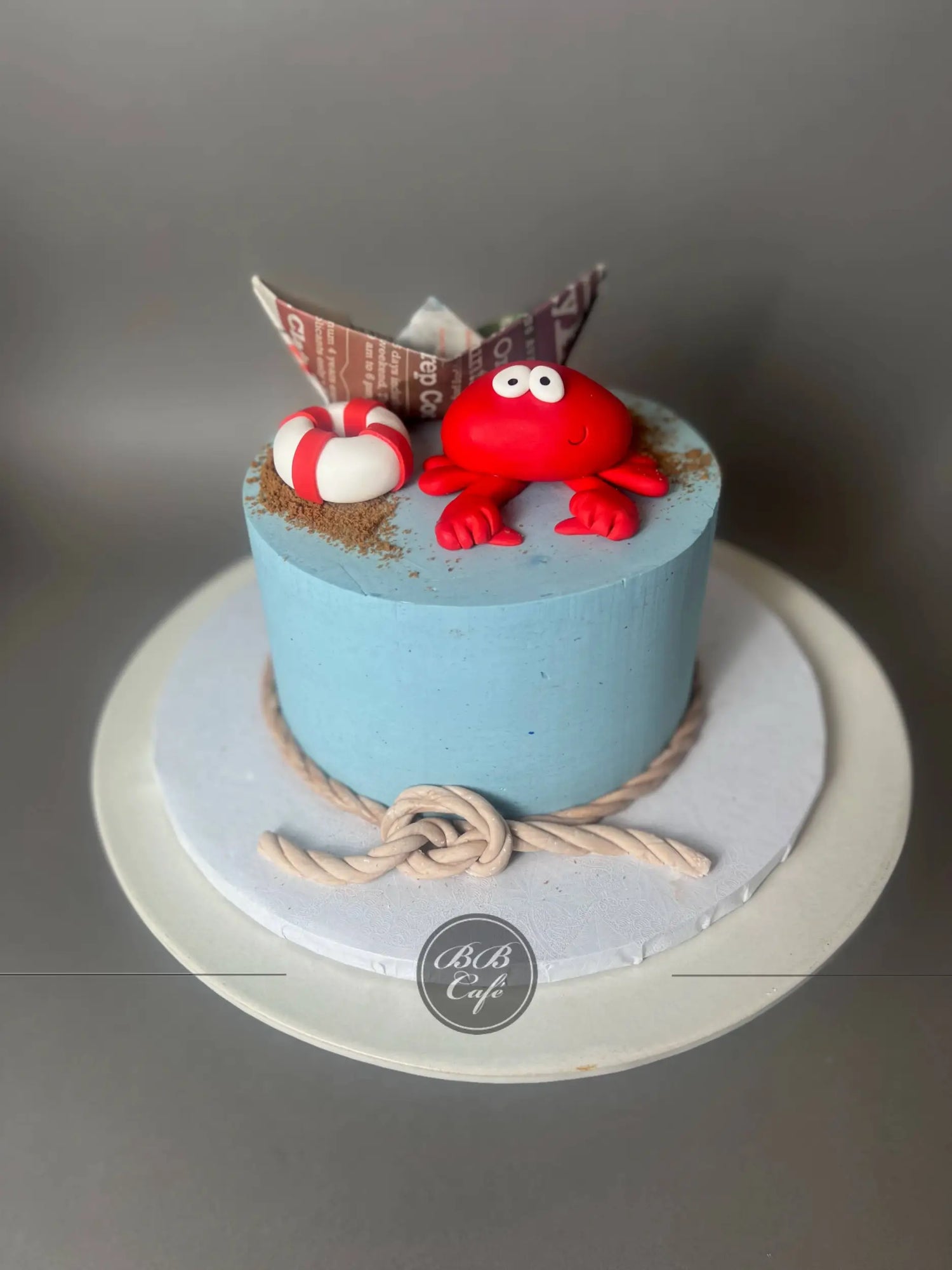 Nautical sea crab &amp; paper boat - custom cake