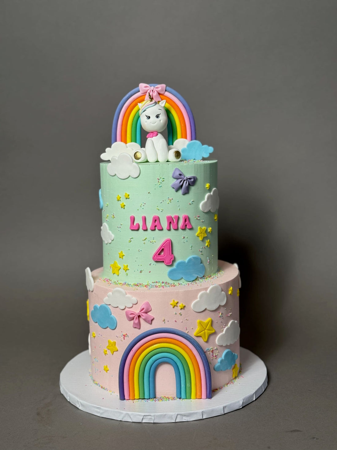 Unicorn and pastel rainbow - custom cake