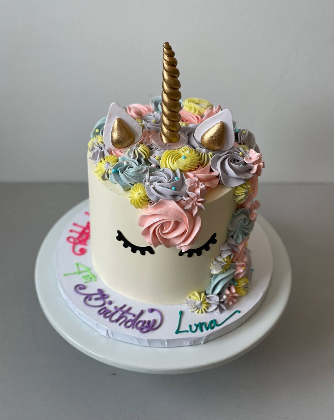 Unicorn face on buttercream - custom cake