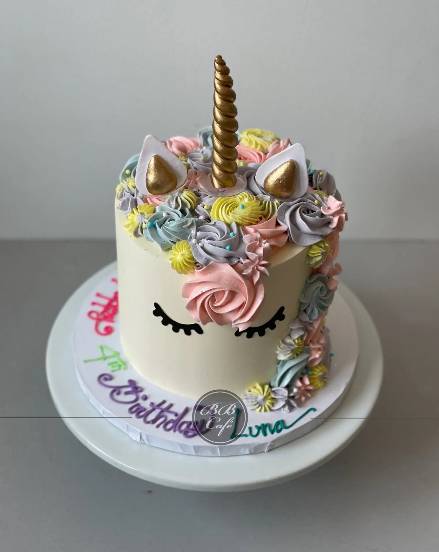 Unicorn face on buttercream - custom cake