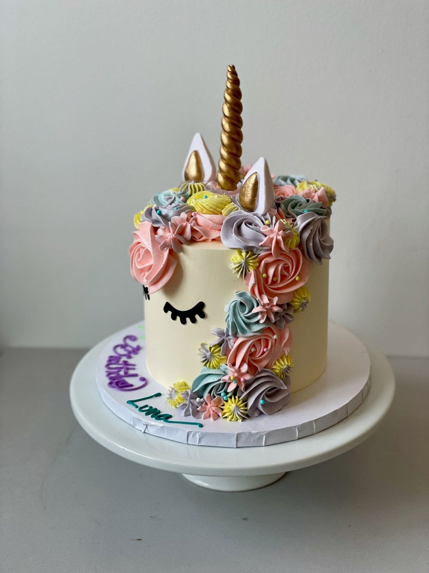 Unicorn face on buttercream - custom cake