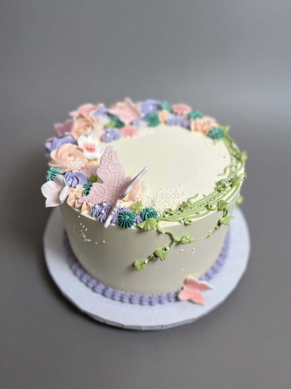 Vines and rosette butterfly on buttercream - custom cake