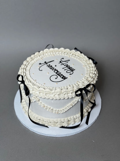 Vintage lambeth &amp; bows on buttercream - custom cake