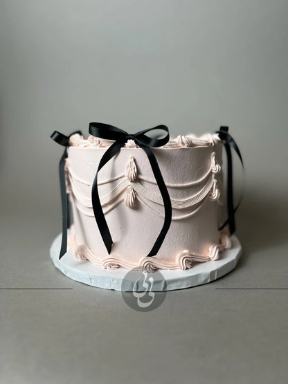 Whipped cream lambeth bow cake - custom cake