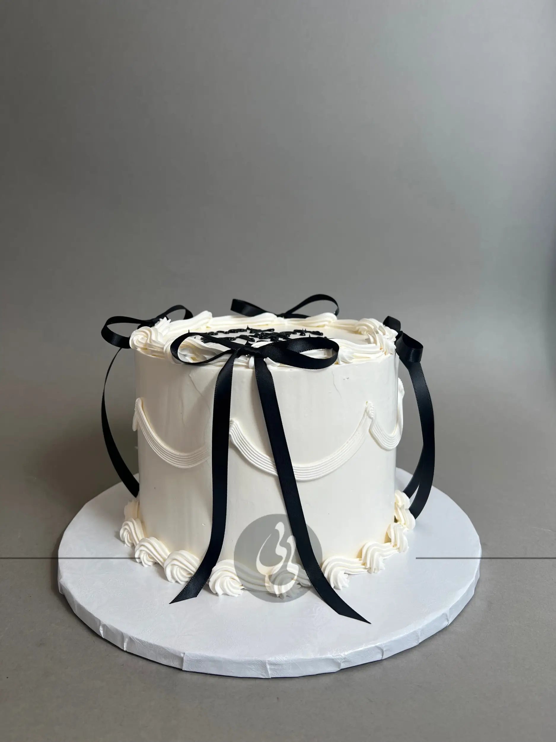 Whipped cream lambeth bow cake - custom cake