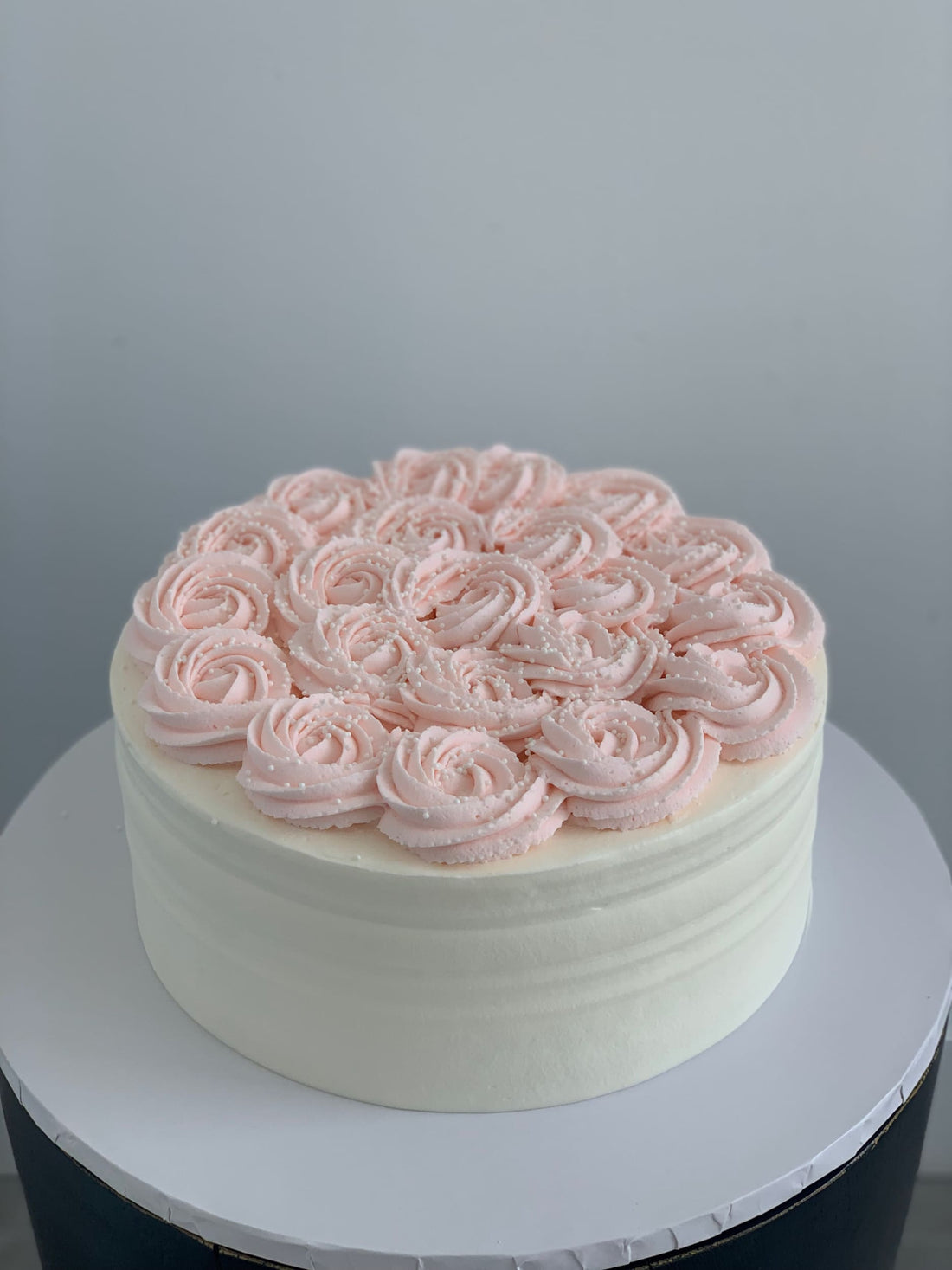 Whipped cream rosettes on top - custom cake