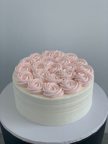 Whipped cream rosettes on top - custom cake