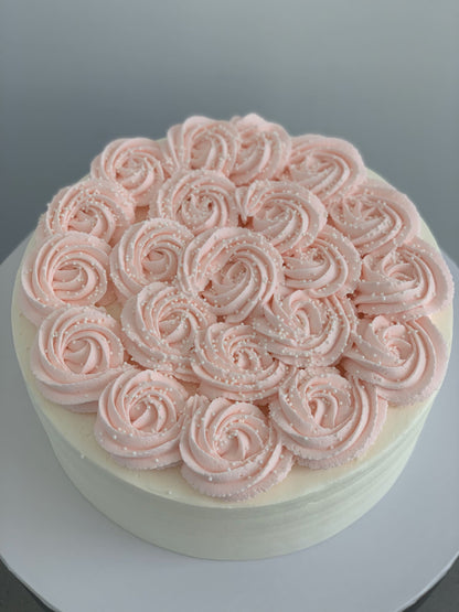 Whipped cream rosettes on top - custom cake