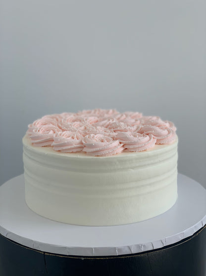 Whipped cream rosettes on top - custom cake
