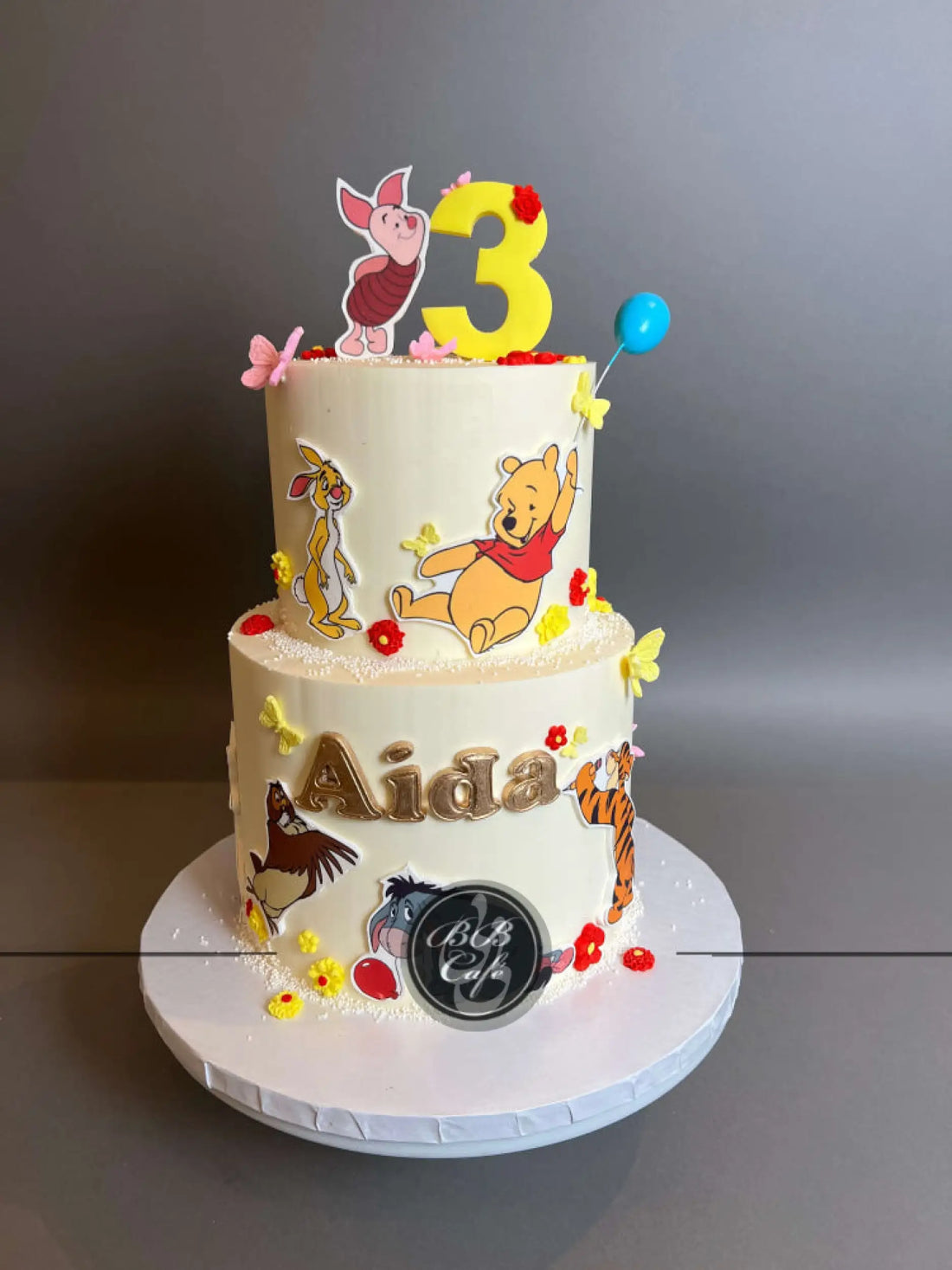 Winnie the pooh edible print on buttercream - custom cake