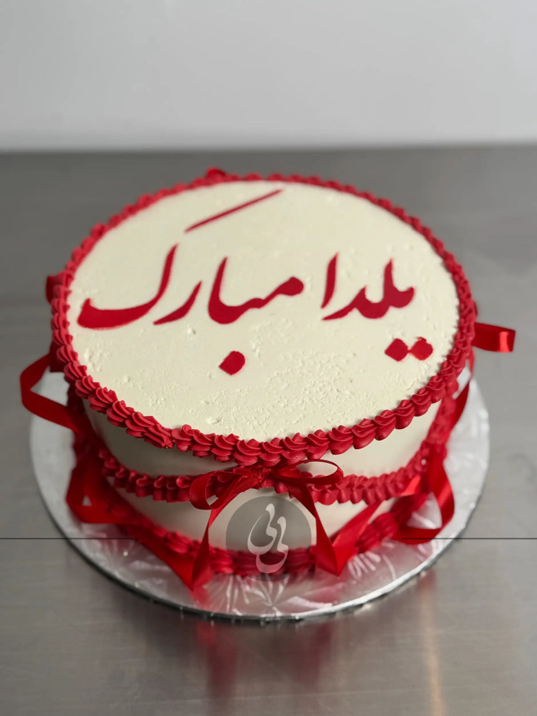 Yalda lambeth and bows cake - custom cake